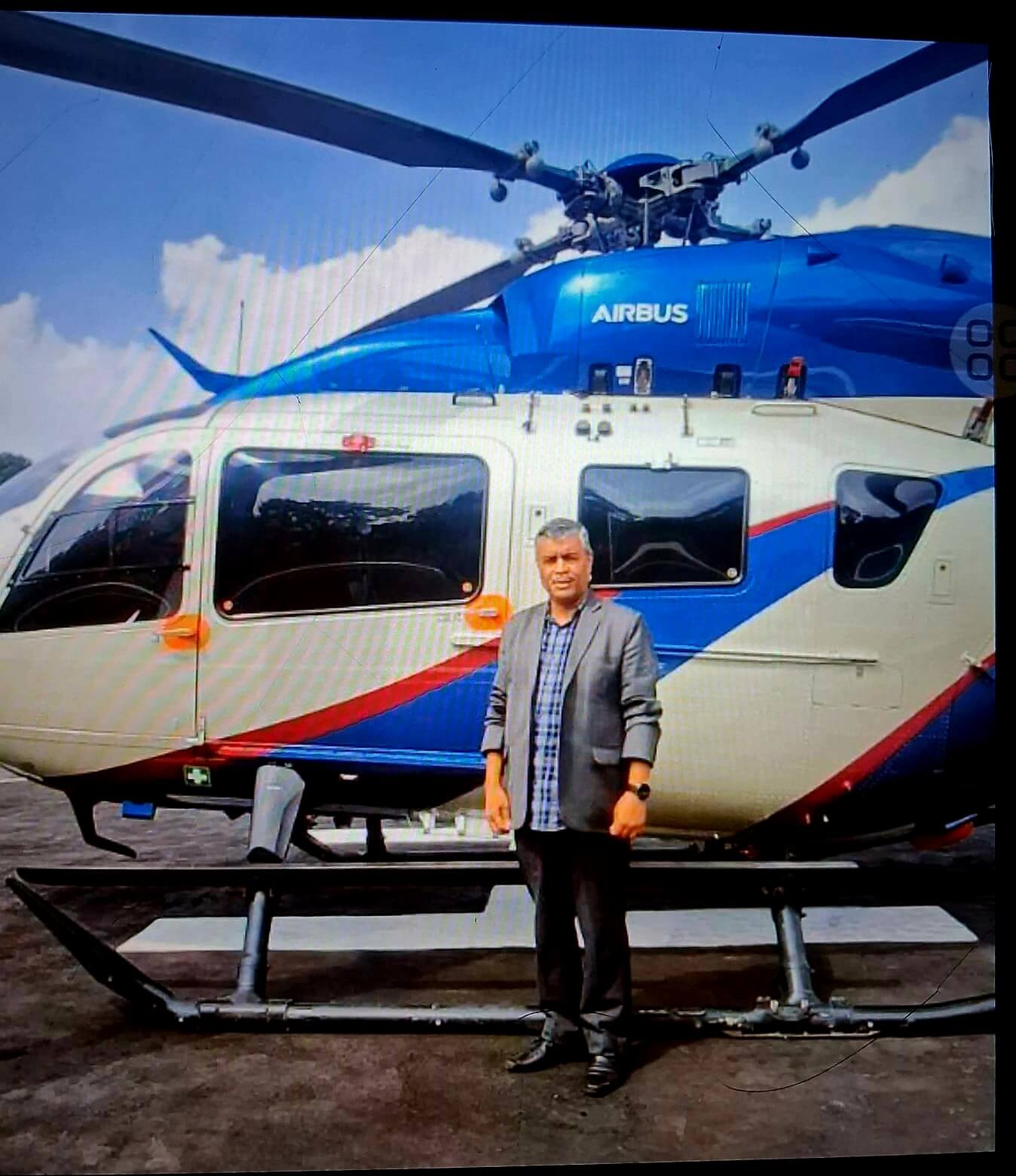 Helicopter flying over Meghalaya's mountain landscape